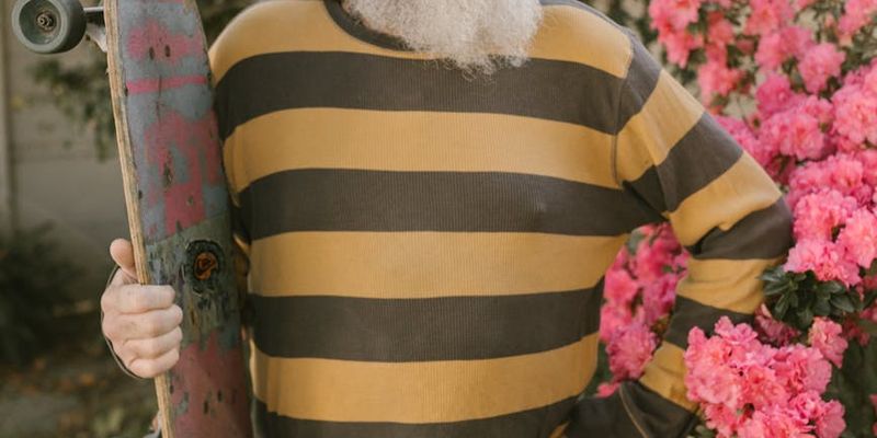 Side view of a person holding a plank pose.